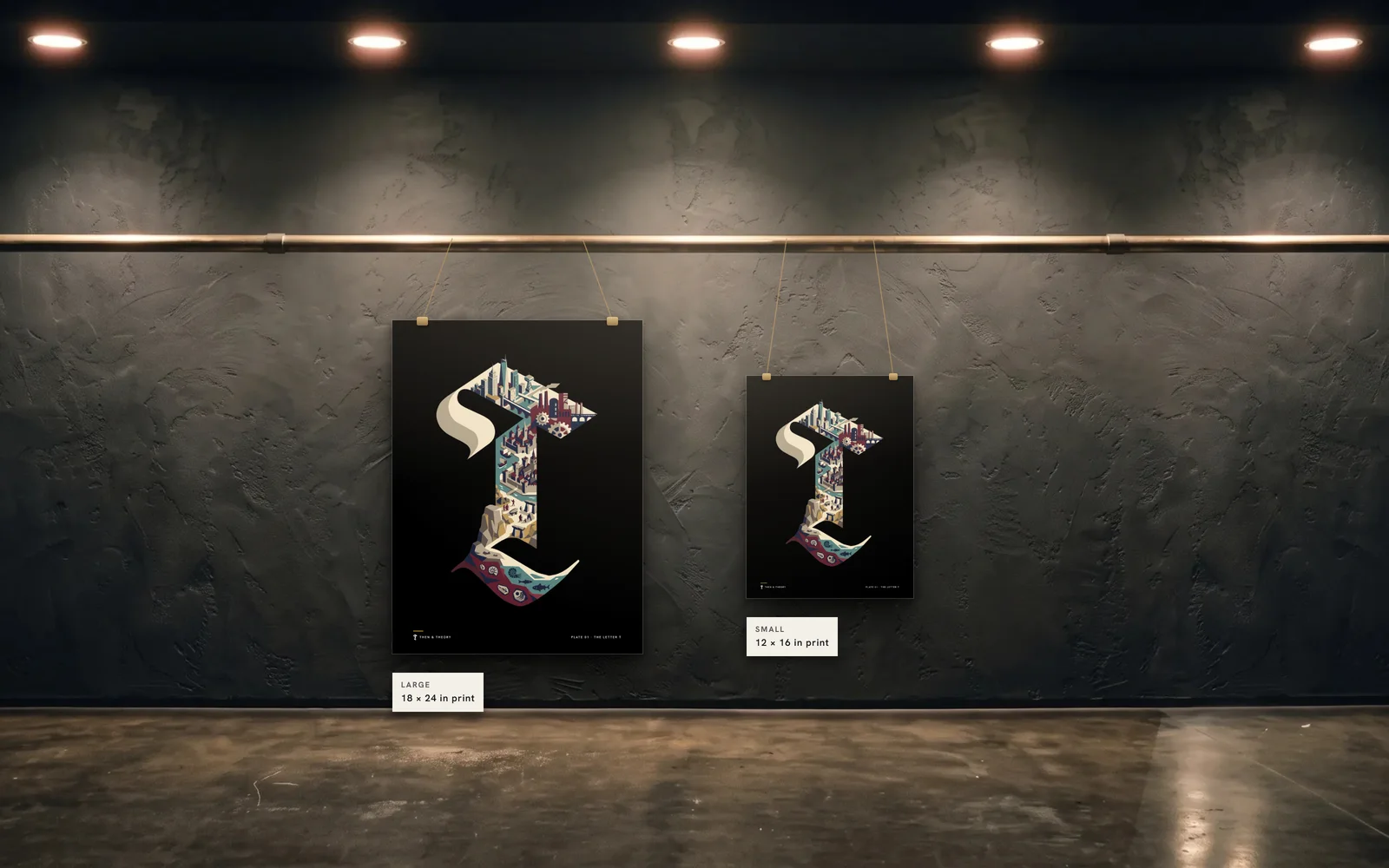 The two sizes to scale on the same wall: an 18 × 24 in print beside a 12 × 16 in print of plate 01, The Letter T.
