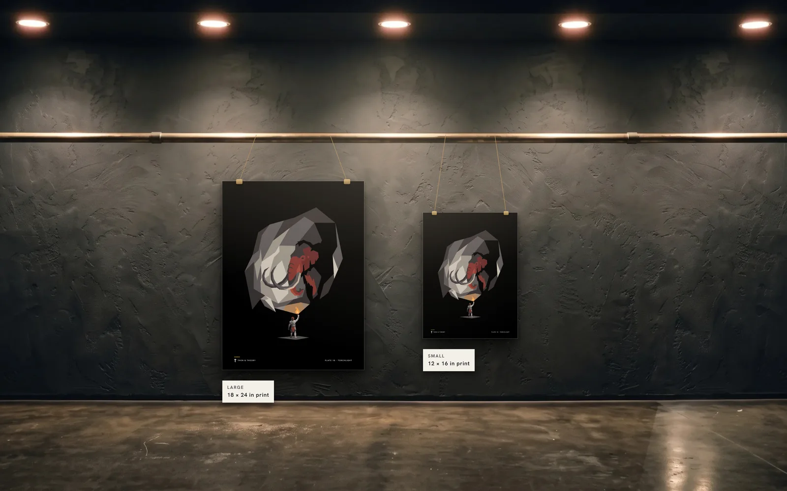 The two sizes to scale on the same wall: an 18 × 24 in print beside a 12 × 16 in print of plate 18, Torchlight.