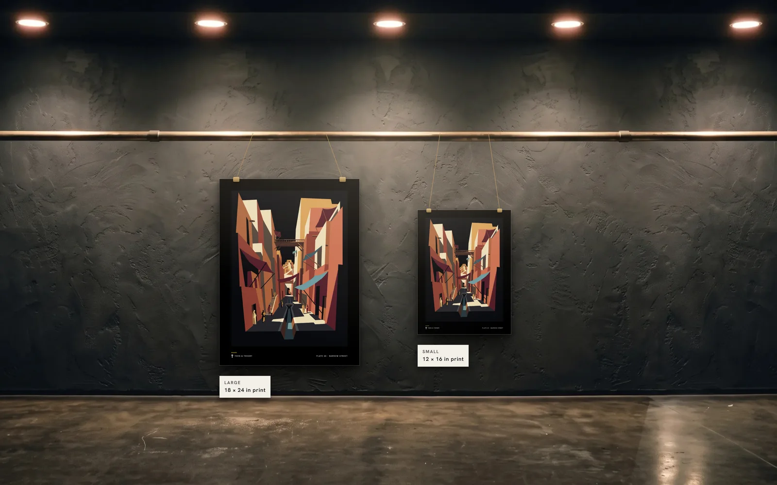 The two sizes to scale on the same wall: an 18 × 24 in print beside a 12 × 16 in print of plate 20, Narrow Street.